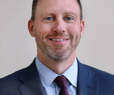 Dr. R. Michael Meneghini